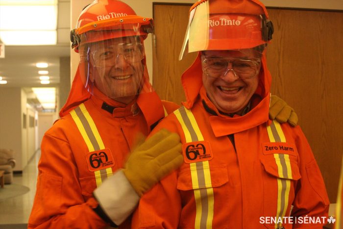 Senator Paul Massicotte, left, and Senator Dennis Patterson, donned protective gear before touring Rio Tinto’s aluminum smelter in Kitimat, B.C.