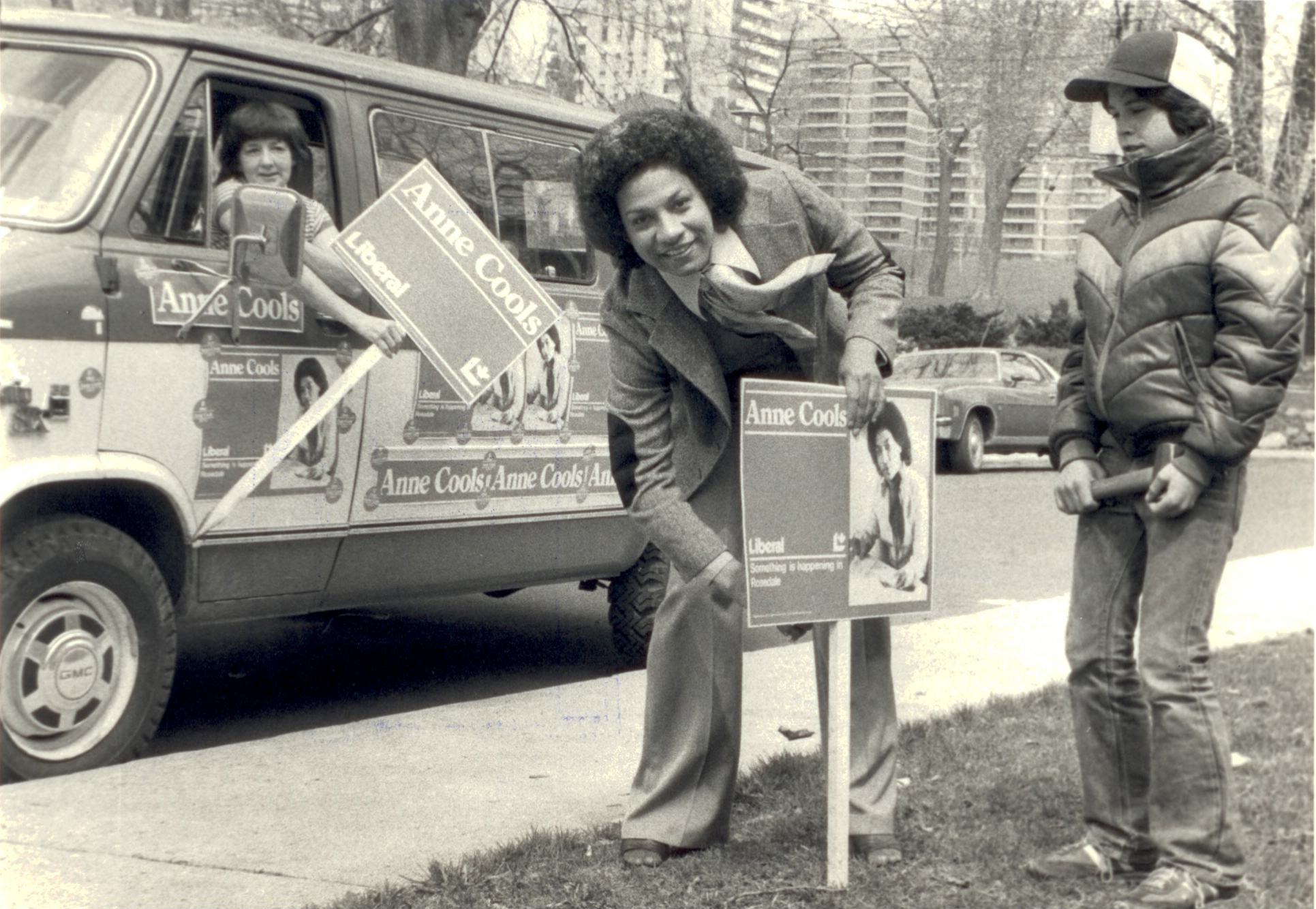 Anne Cools planting signs while on the campaign trail in 1980. Cools ran for Member of Parliament for the riding of Rosedale in Toronto.