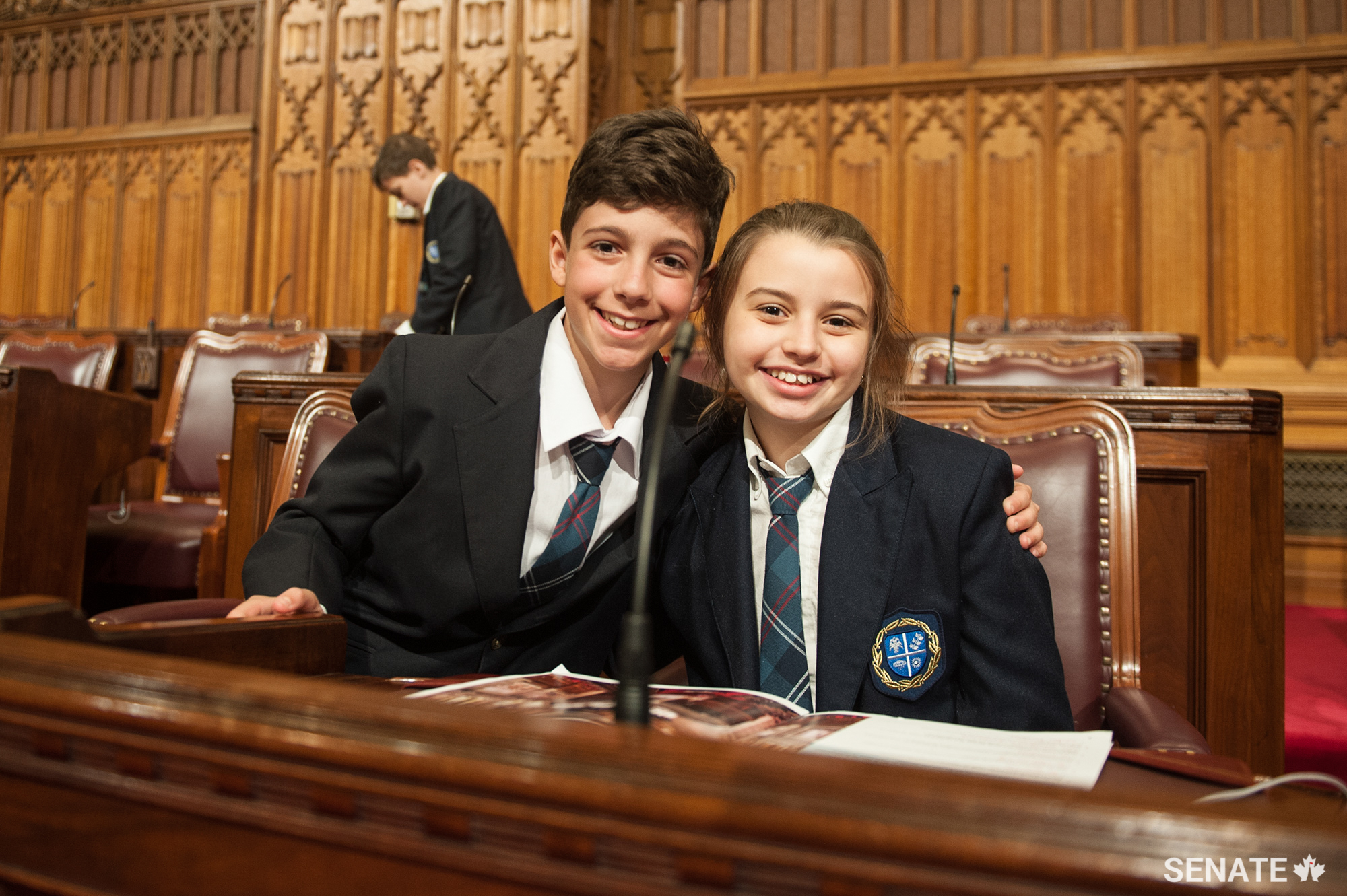 Two students take part in the day's activities at the Senate.