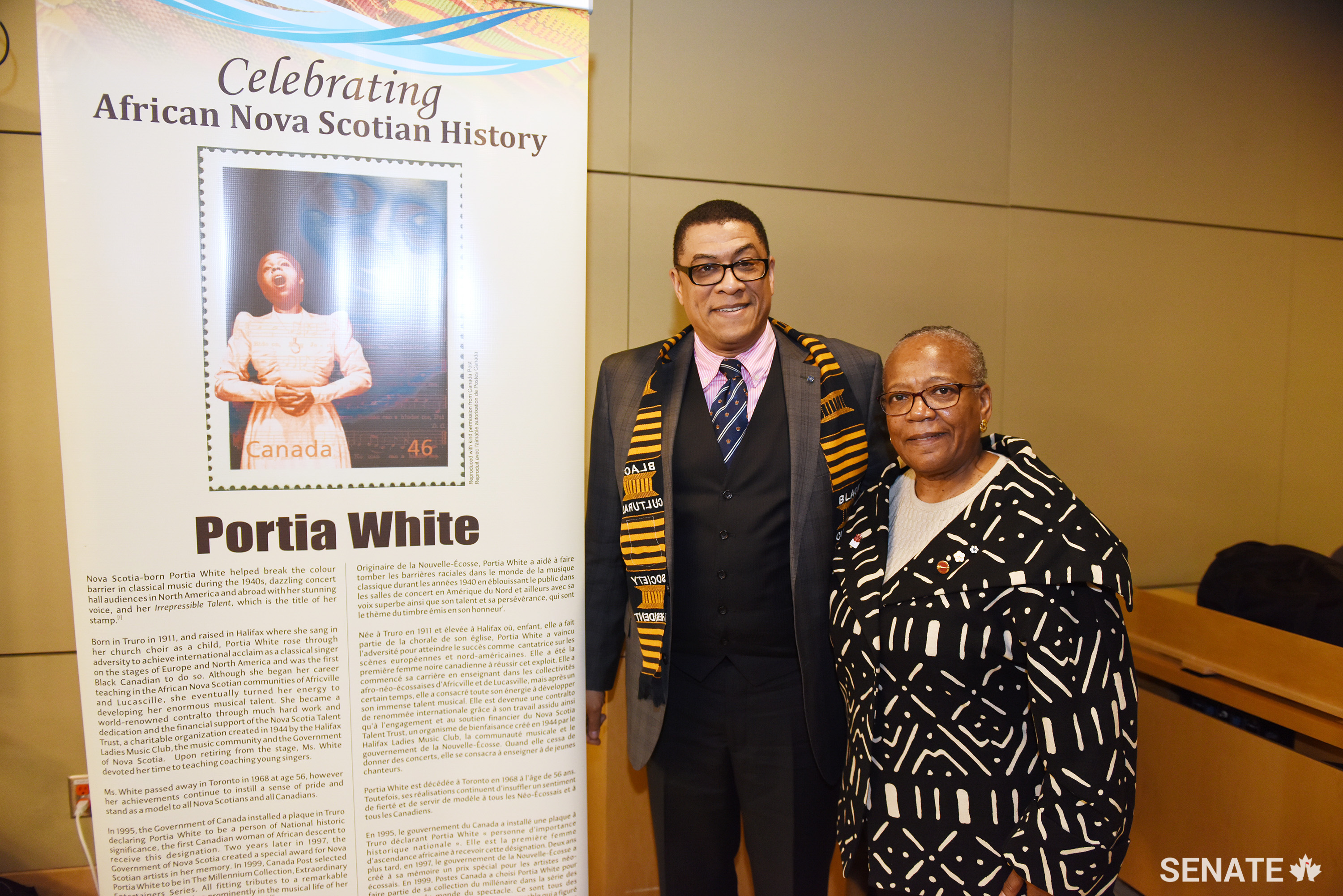 Committee chair Senator Wanda Thomas Bernard, right, chats with Craig Smith, chair and president of the Black Cultural Society for Nova Scotia.