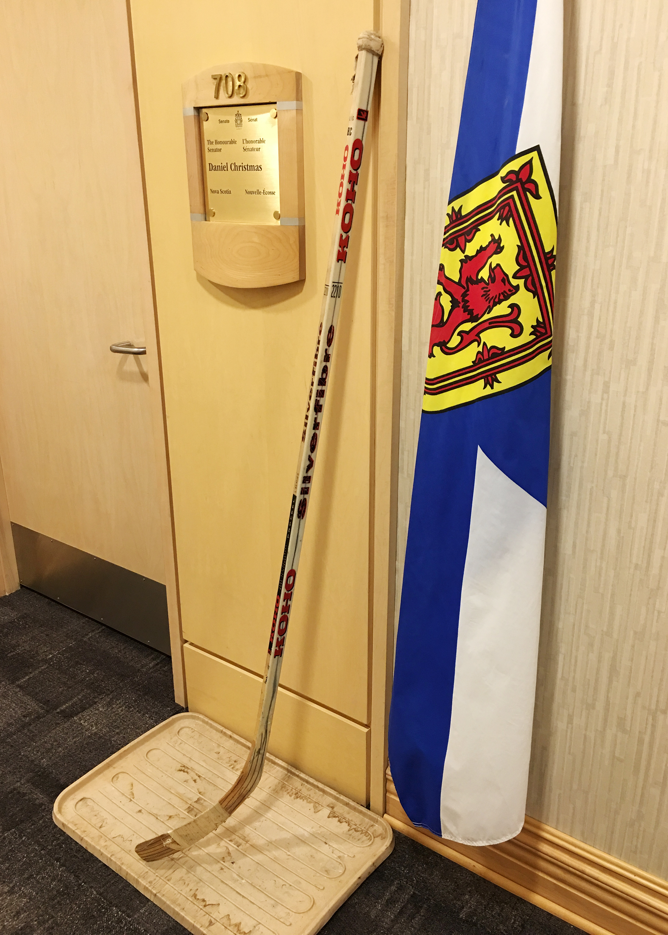 A hockey stick outside Senator Dan Christmas’s office.