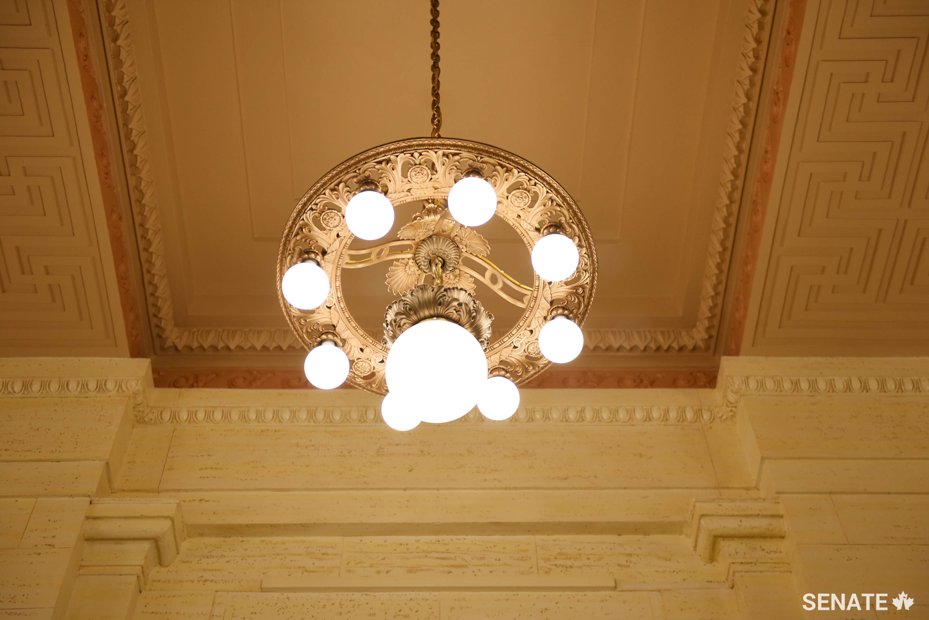The building’s original 1912 chandeliers were carefully removed, cleaned and restored using new LED lighting and updated electrical features to improve energy efficiency. Recent developments in LED technology allow architects to maintain the warm light of the original fixtures.