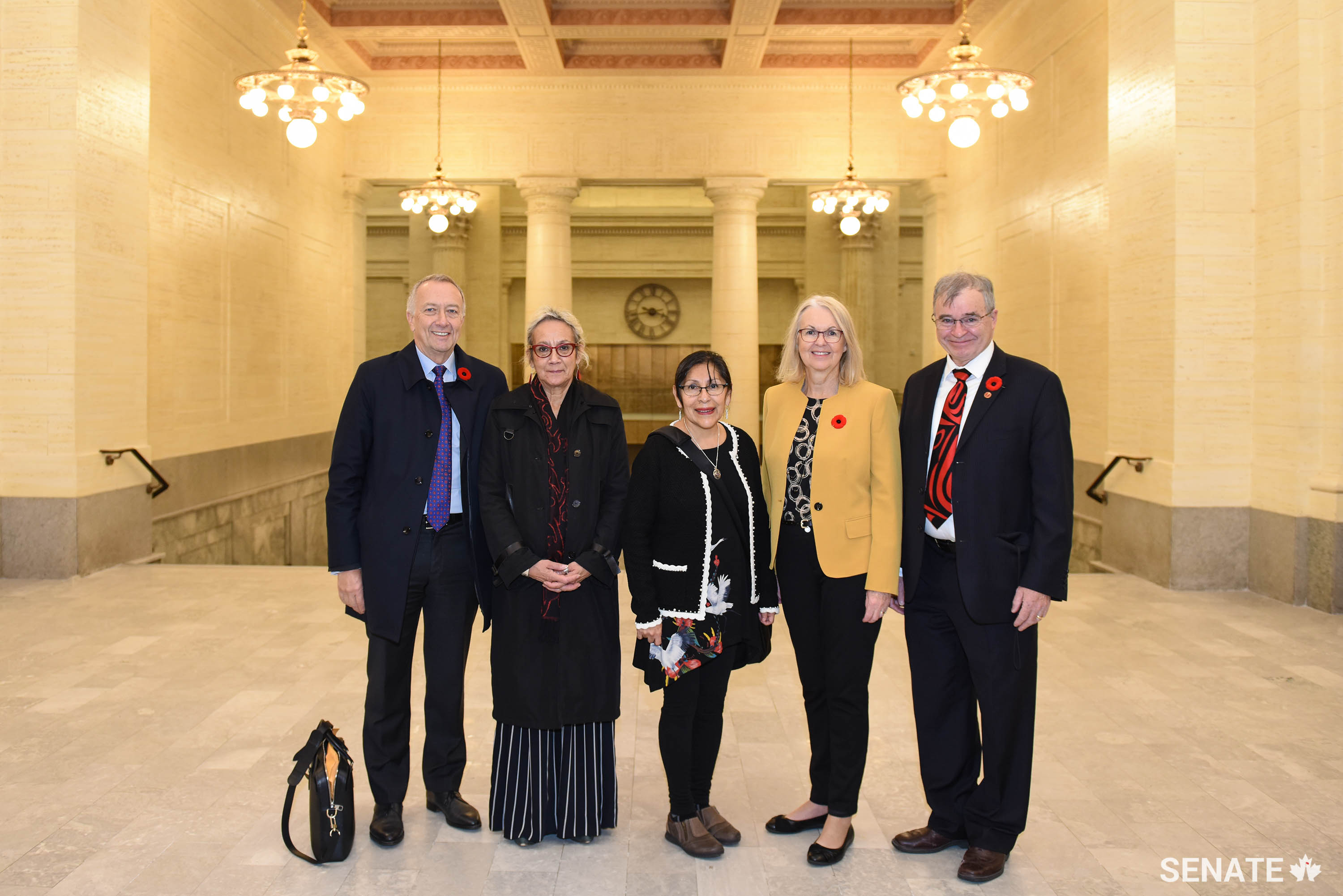 From left, Senate Committee on Energy, the Environment and Natural Resources members senators Paul J. Massicotte, Mary Jane McCallum, committee chair Rosa Galvez, Jane Cordy and Dennis Patterson tour the Senate of Canada Building to learn how this heritage building meets Green Globe sustainability standards. The tour was part of a study by the committee on the effect that transitioning to a low-carbon economy will have on Canada’s buildings.