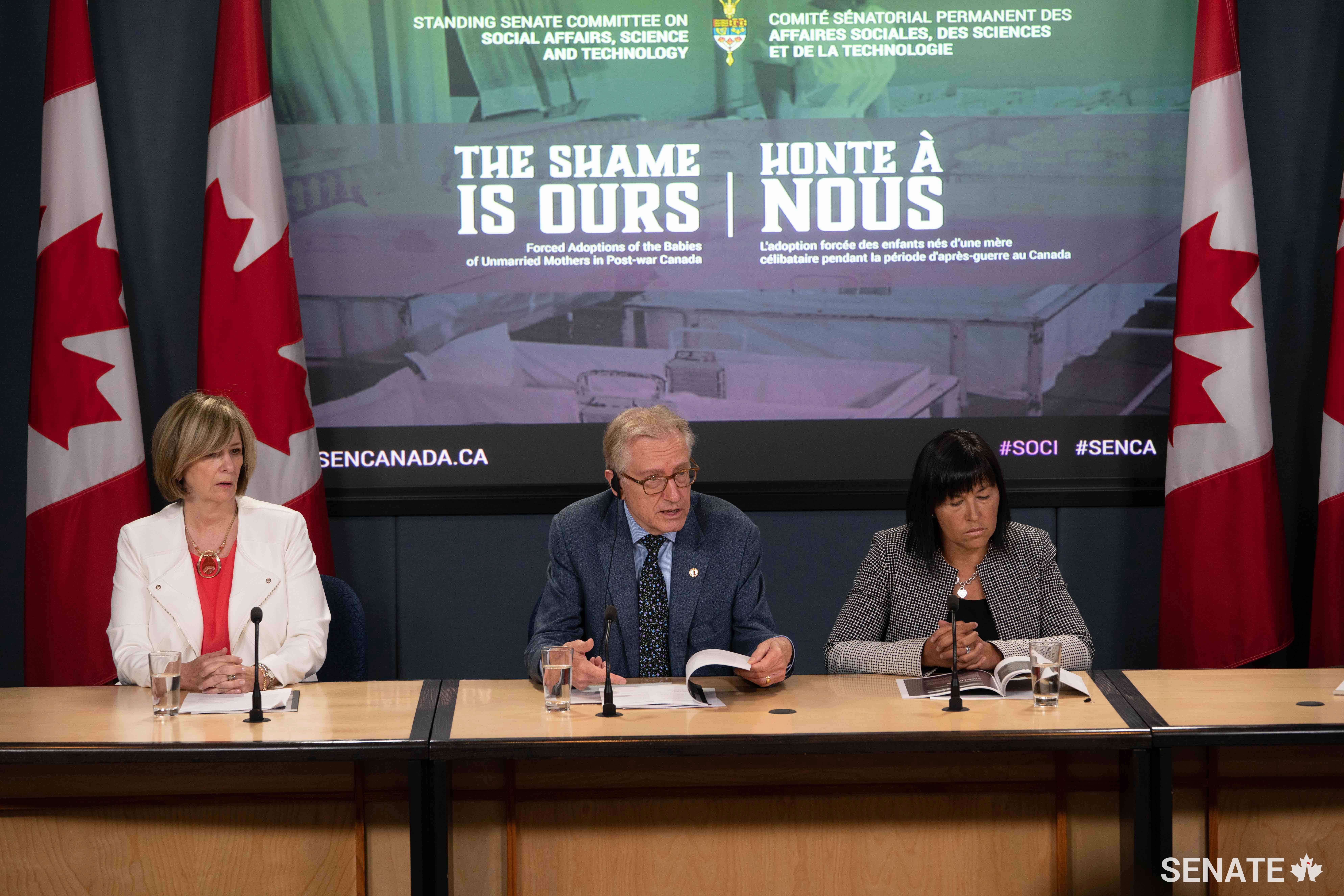 From left: Origins Canada executive director Valerie Andrews joins members of the Senate Committee on Social Affairs, Science and Technology — the Hon. Art Eggleton, a former senator, and Senator Chantal Petitclerc — at a press conference on July 19, 2018. The committee released a report on the post-war practice of forced adoptions of babies of unmarried mothers in Canada.
