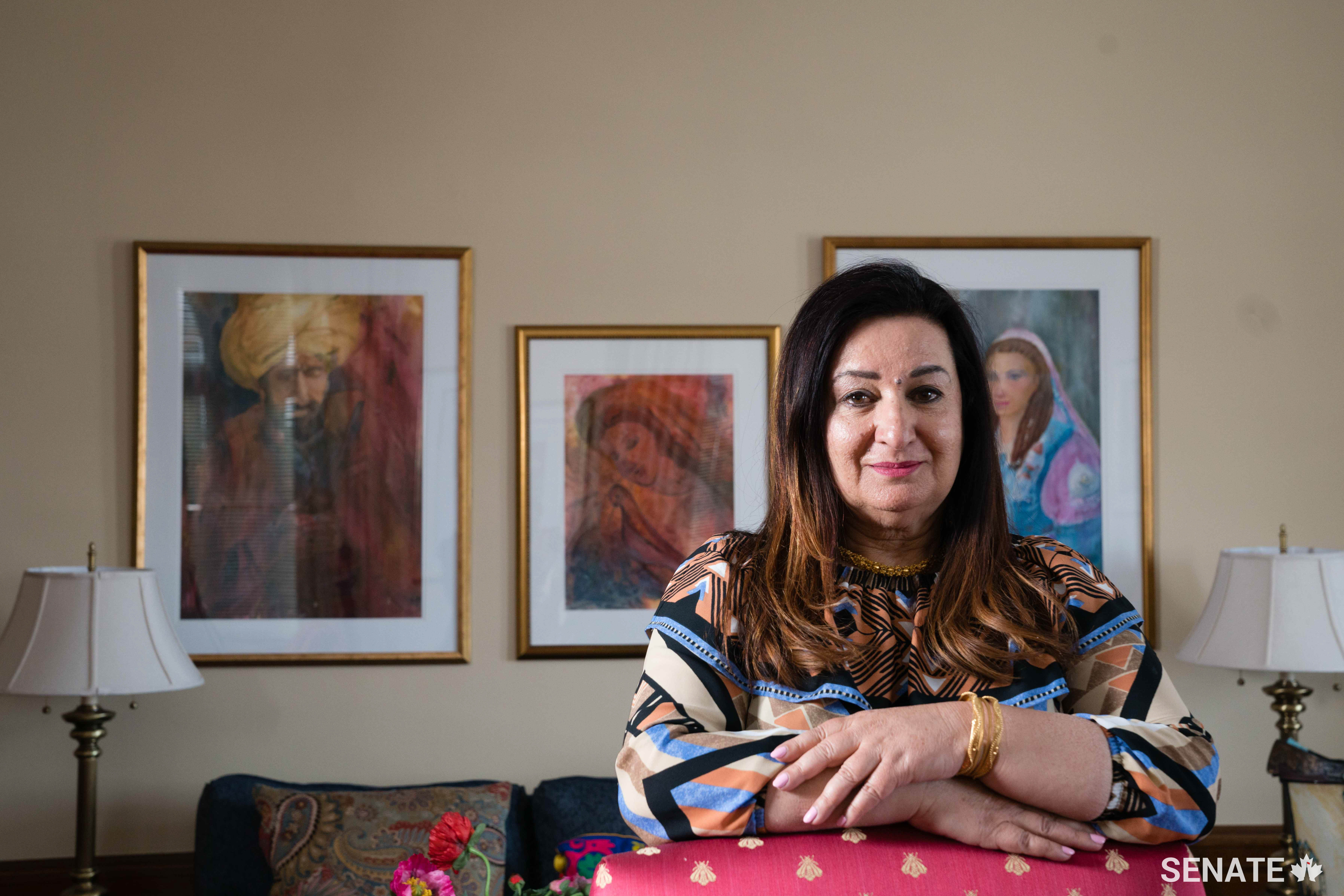 Senator Salma Ataullahjan paints scenes inspired by her travels and by Pakistani literature. Several of her finished works hang in her East Block office.