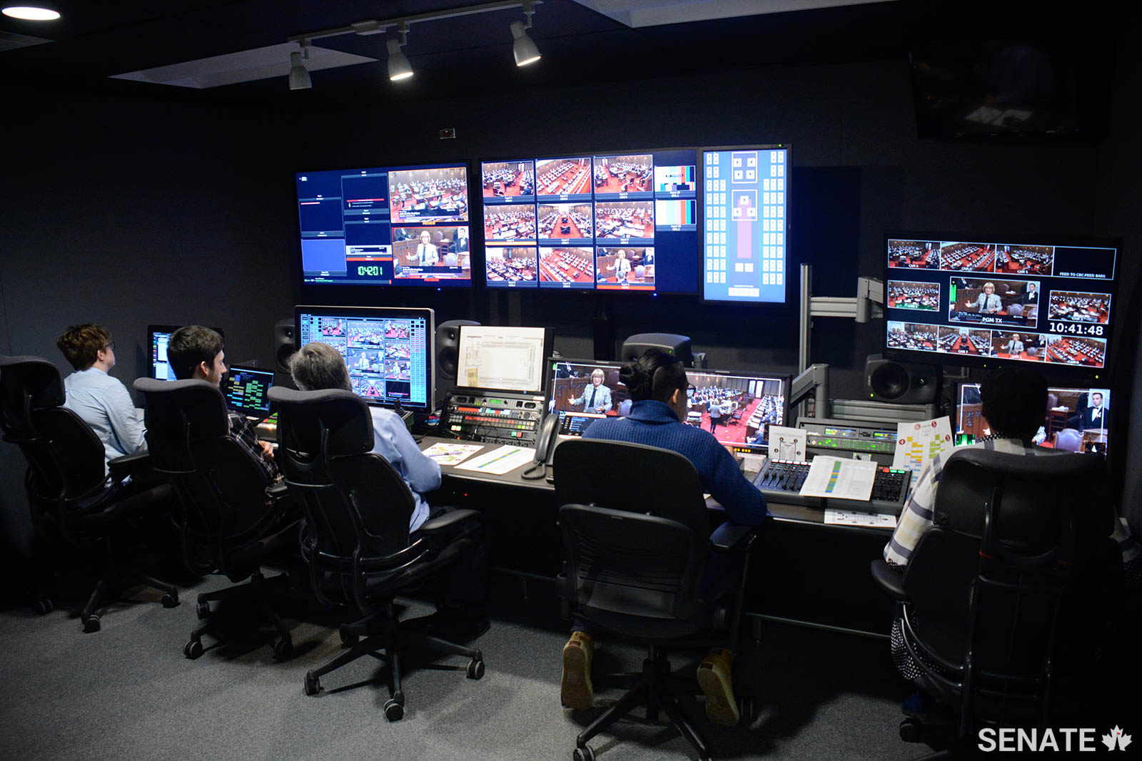 Students from La Cité collégiale and Algonquin College take command of an internal television feed in the Senate control room. The Senate began televising Chamber proceedings in February 2019.