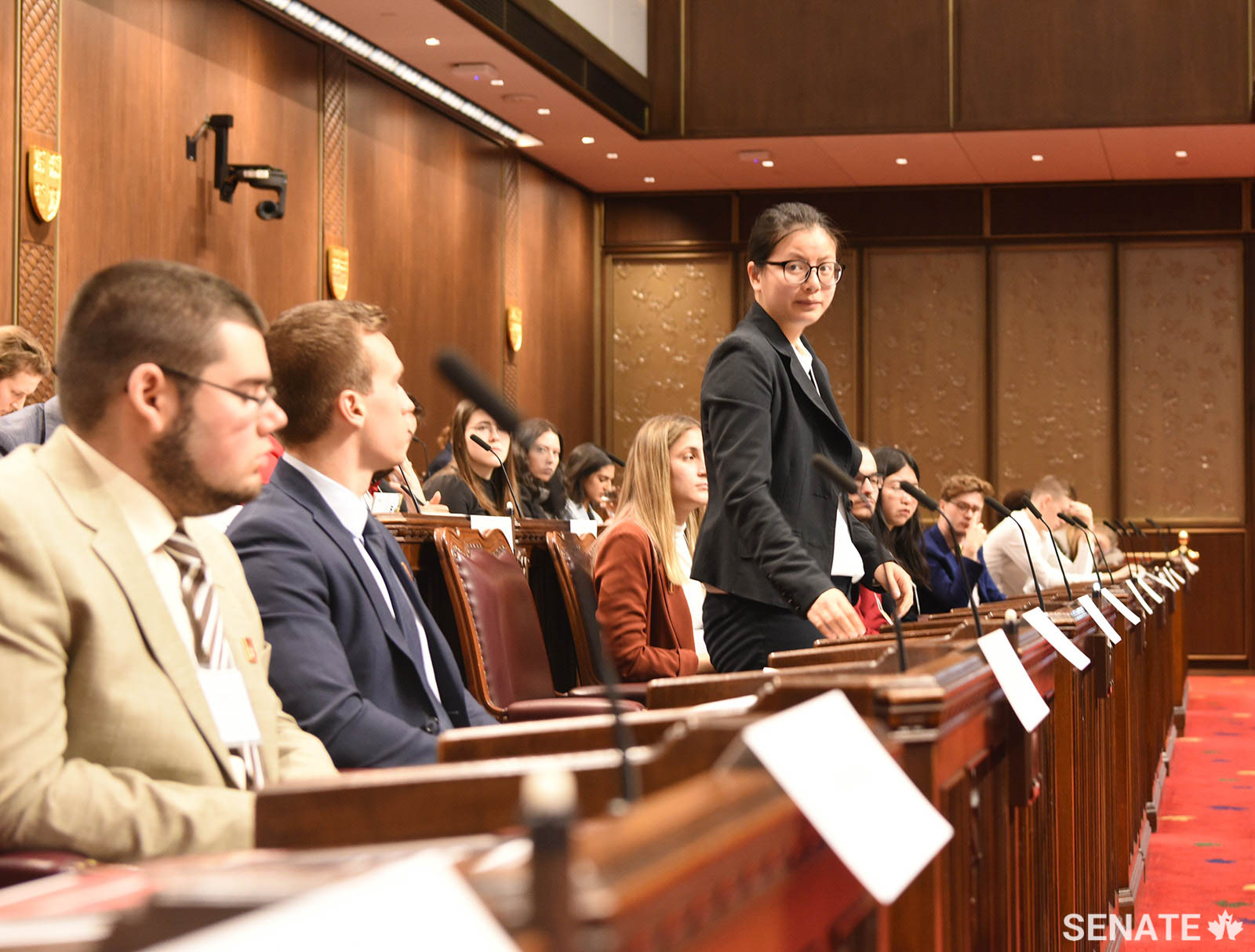 A model Senate participant pauses during her speech in the Red Chamber. About 60 students from the University of Ottawa, Carleton University and the Université du Québec en Outaouais took part in the event.