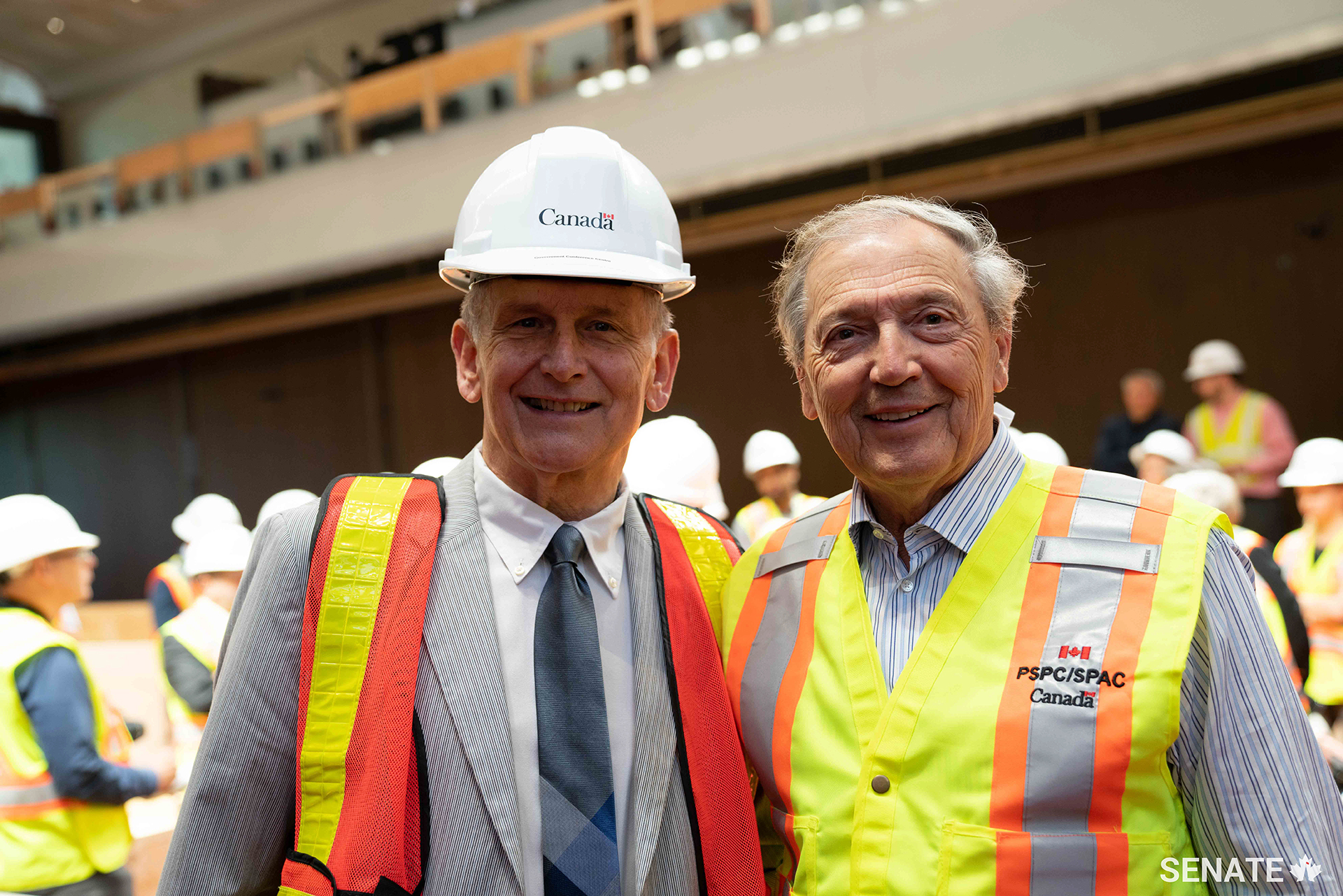 Senator David Tkachuk, right, and Senator Larry W. Smith tour the new Senate of Canada Building during the renovations in 2018.