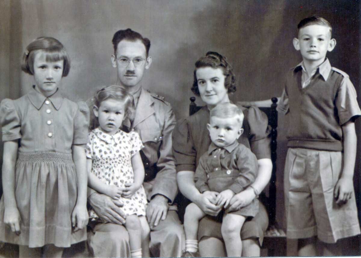 Capt. Roland Bacon with his family in this undated photo. (Photo credit: Elizabeth Pearl Bacon)