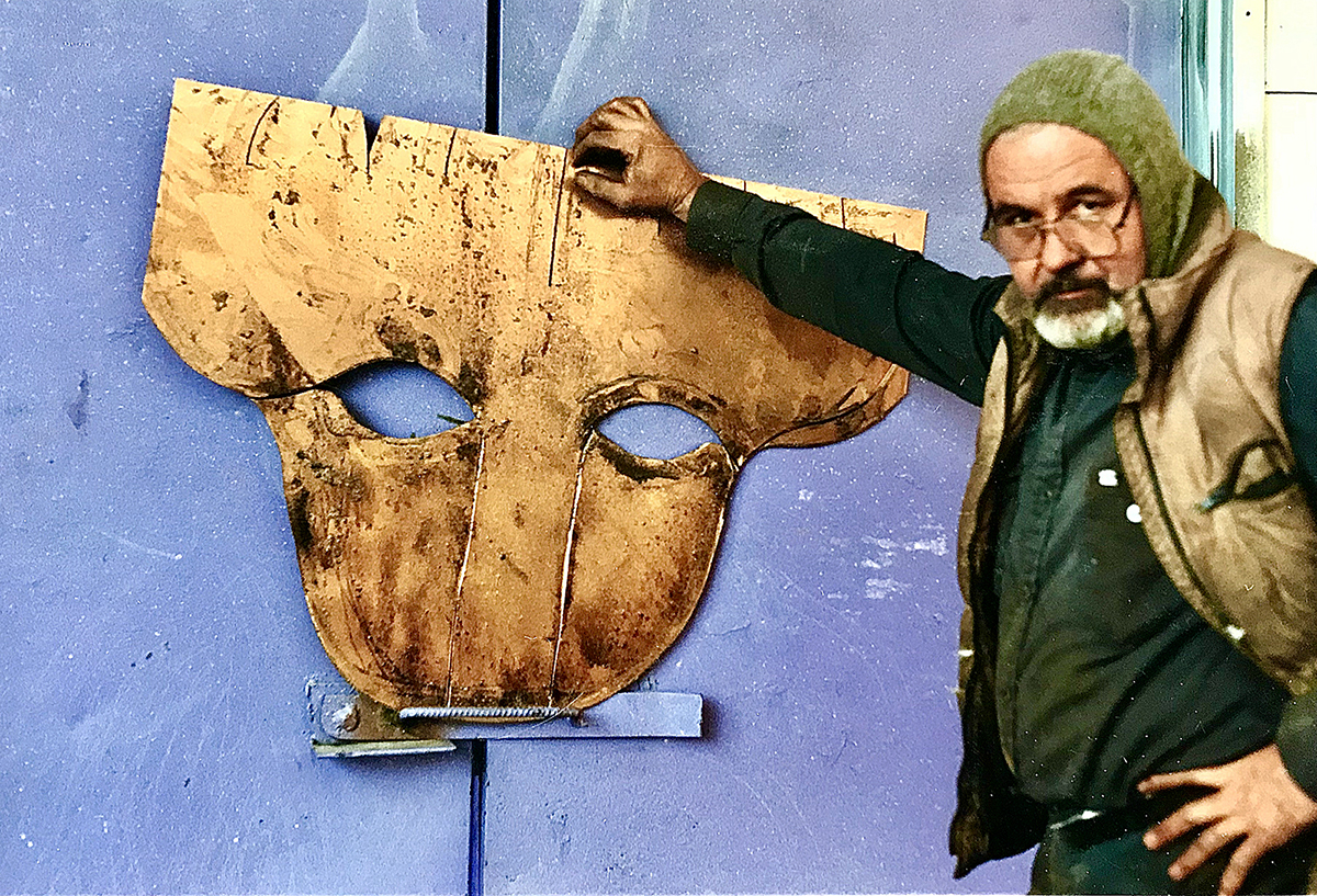Mr. Garner prepares to shape a bronze cutout that would become the head of the grizzly bear in <em>Territorial Prerogative</em>. (Photo credit: Courtesy of Tamaya Garner)